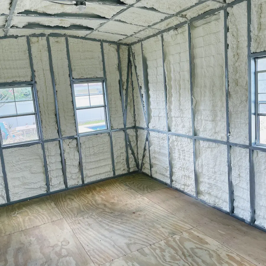 Closed-cell spray foam insulation applied to wall cavities in a residential project in Oak Park